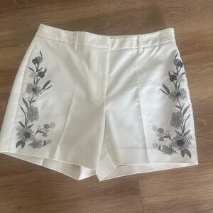 White House black market Short with silver flowers size8